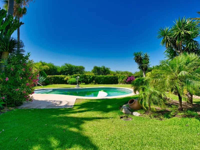 This remarkable beachfront villa, located adjacent to the renowned Nikki Beach in Elviria, East Marbella, offers an unparalleled living experience. Spread across two levels, the villa features four spacious bedrooms, each with its own en-suite bathroom, a