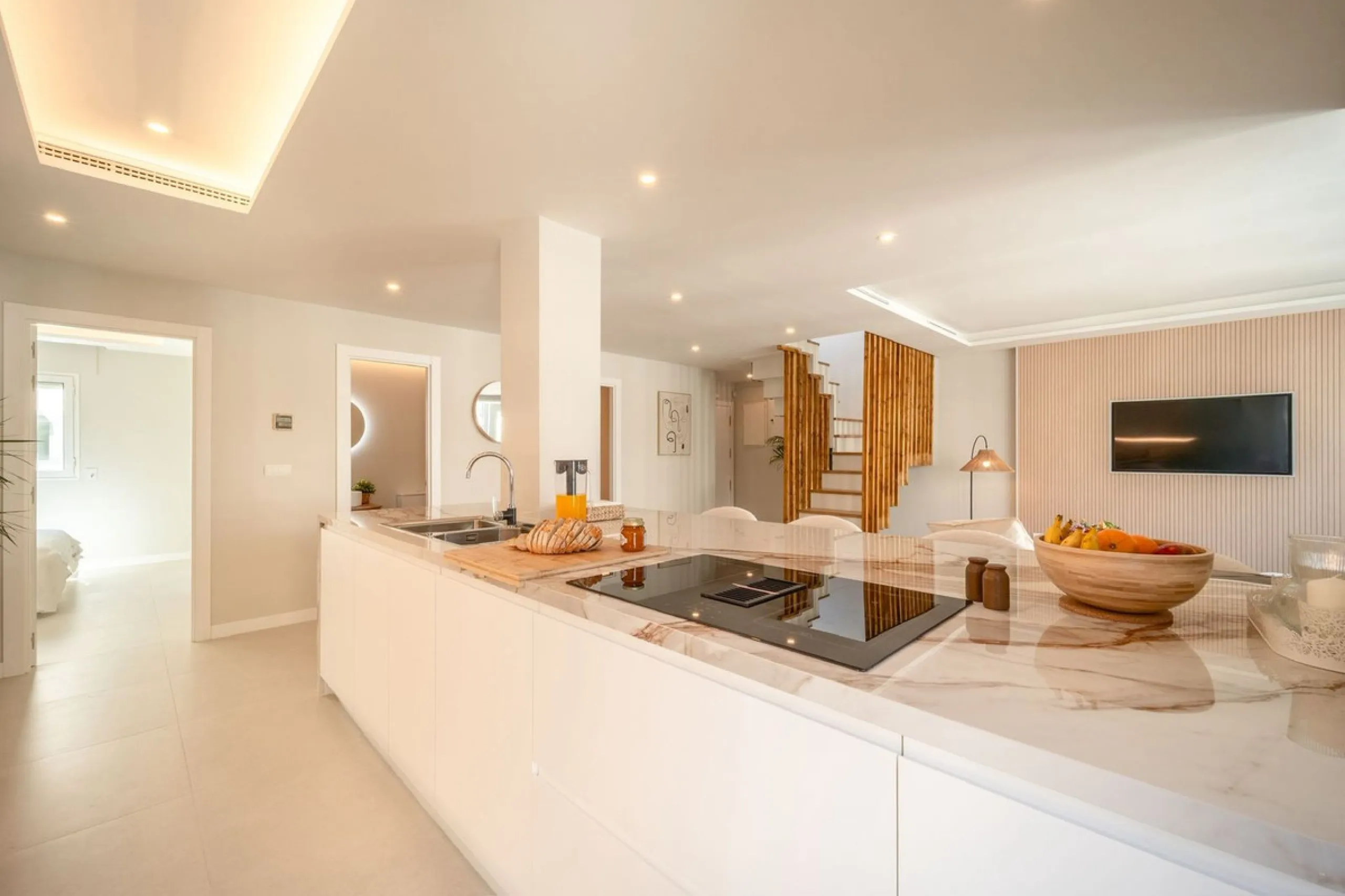 Experience luxurious living in this stunning newly refurbished penthouse, located in the prime area of Marbella Nueva Andalucía, just a short walk to Puerto Banús. This sleek and modern property features four spacious bedrooms, each with its own en-suite 