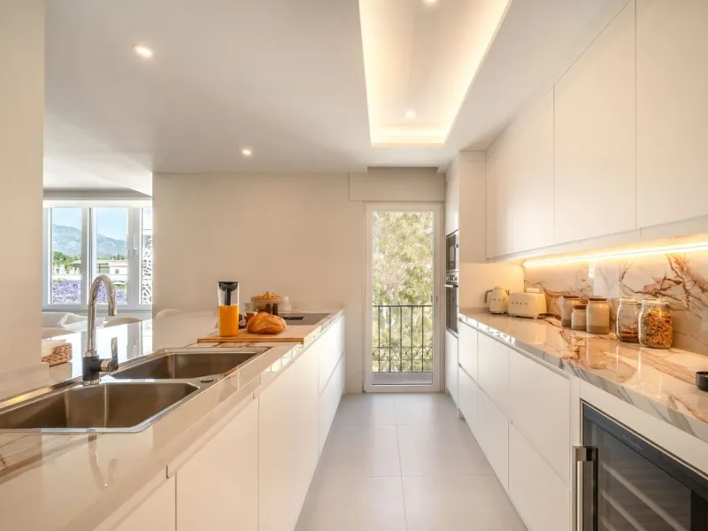 Experience luxurious living in this stunning newly refurbished penthouse, located in the prime area of Marbella Nueva Andalucía, just a short walk to Puerto Banús. This sleek and modern property features four spacious bedrooms, each with its own en-suite 