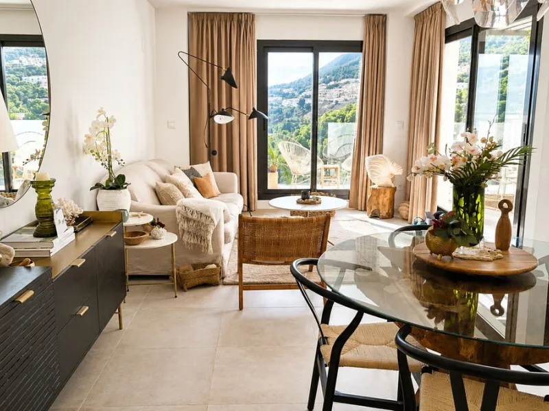 This penthouse in Benalmadena is listed at €545,000 and offers 84 m² of interior living space with two bedrooms, two bathrooms, direct access to a 71 m² total terrace area including a private rooftop solarium, plus two parking spaces and a storage room—al