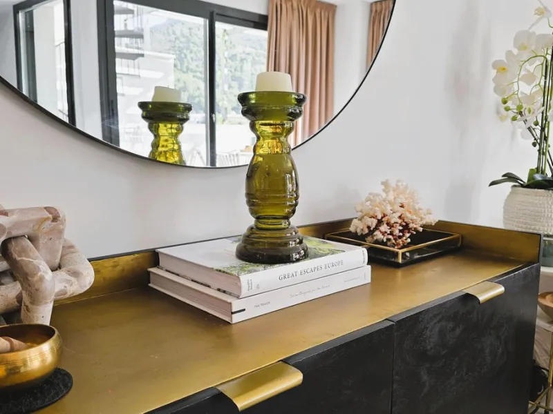 This penthouse in Benalmadena is listed at €545,000 and offers 84 m² of interior living space with two bedrooms, two bathrooms, direct access to a 71 m² total terrace area including a private rooftop solarium, plus two parking spaces and a storage room—al
