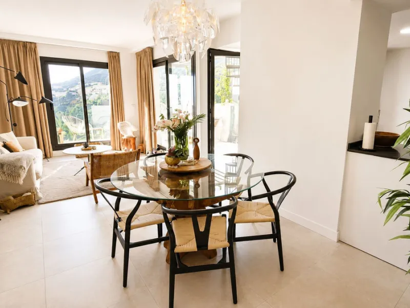This penthouse in Benalmadena is listed at €545,000 and offers 84 m² of interior living space with two bedrooms, two bathrooms, direct access to a 71 m² total terrace area including a private rooftop solarium, plus two parking spaces and a storage room—al