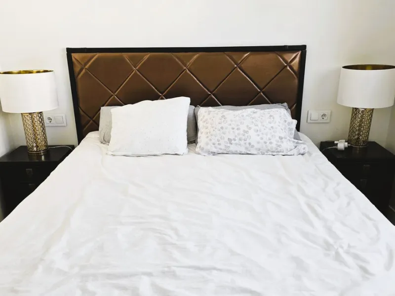This penthouse in Benalmadena is listed at €545,000 and offers 84 m² of interior living space with two bedrooms, two bathrooms, direct access to a 71 m² total terrace area including a private rooftop solarium, plus two parking spaces and a storage room—al