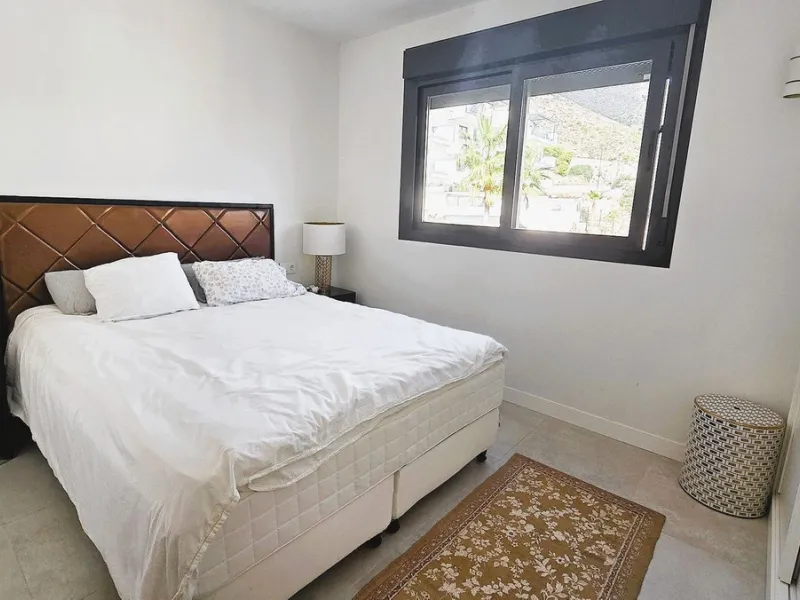 This penthouse in Benalmadena is listed at €545,000 and offers 84 m² of interior living space with two bedrooms, two bathrooms, direct access to a 71 m² total terrace area including a private rooftop solarium, plus two parking spaces and a storage room—al