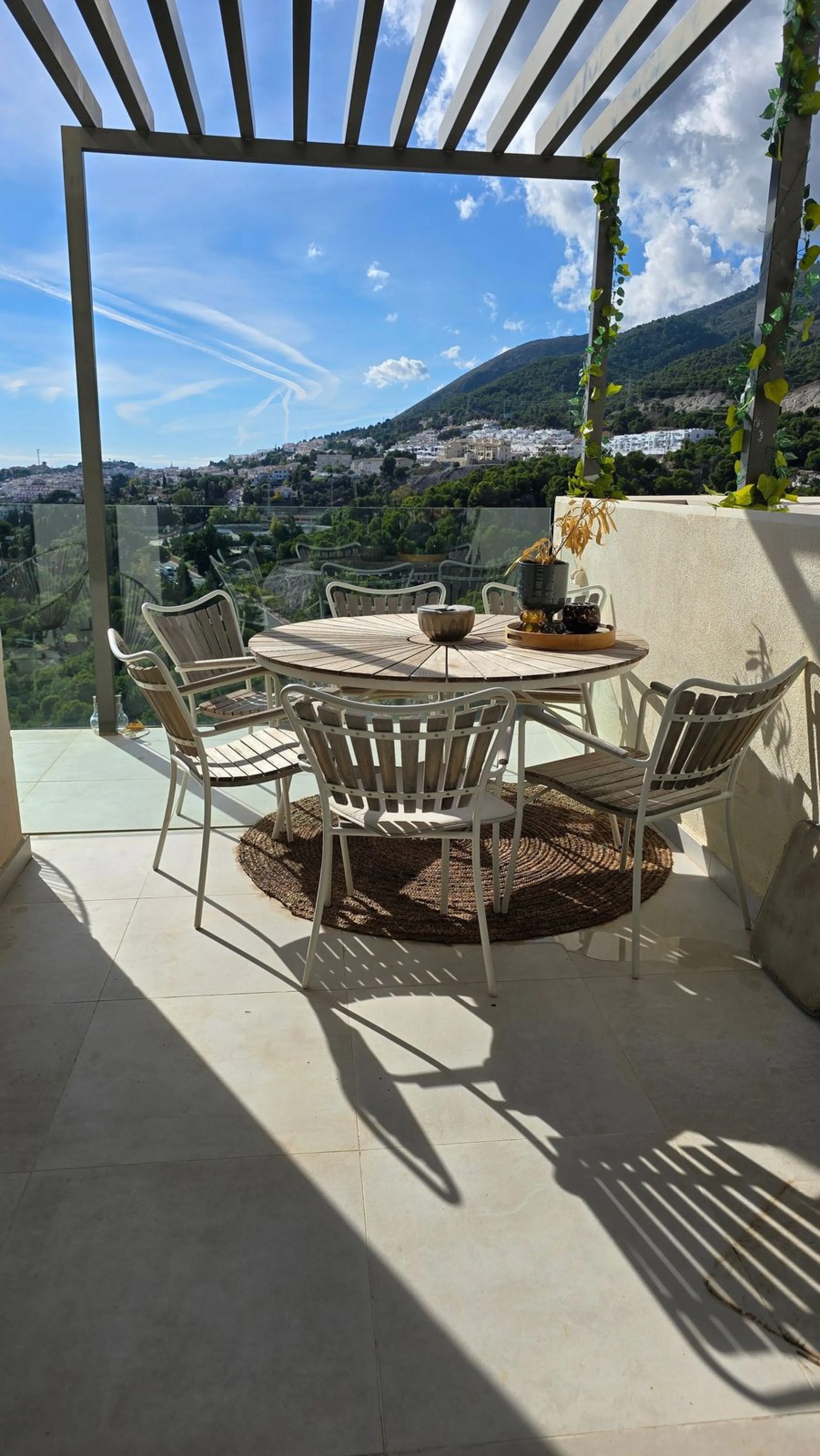 This penthouse in Benalmadena is listed at €545,000 and offers 84 m² of interior living space with two bedrooms, two bathrooms, direct access to a 71 m² total terrace area including a private rooftop solarium, plus two parking spaces and a storage room—al
