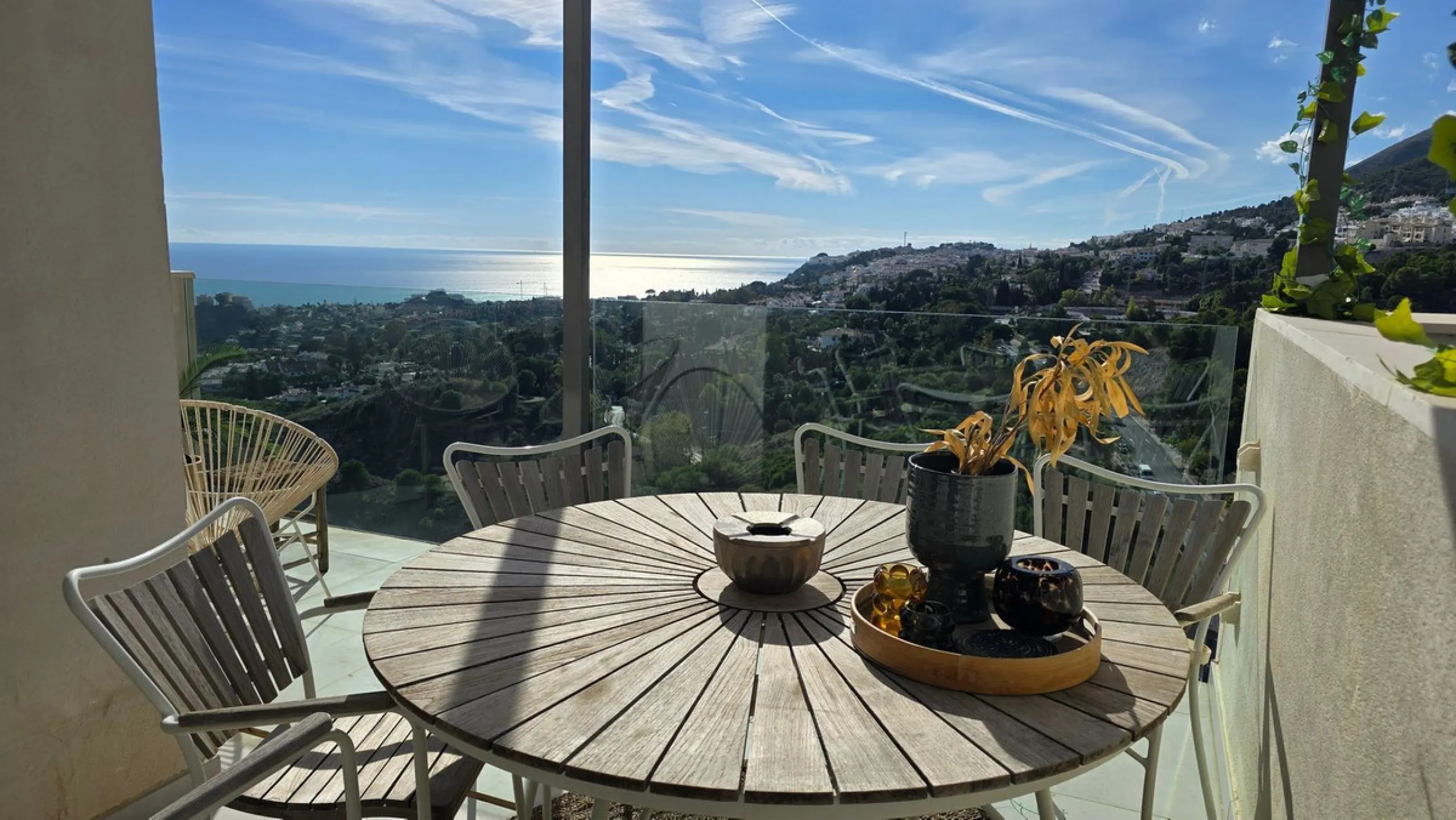 This penthouse in Benalmadena is listed at €545,000 and offers 84 m² of interior living space with two bedrooms, two bathrooms, direct access to a 71 m² total terrace area including a private rooftop solarium, plus two parking spaces and a storage room—al