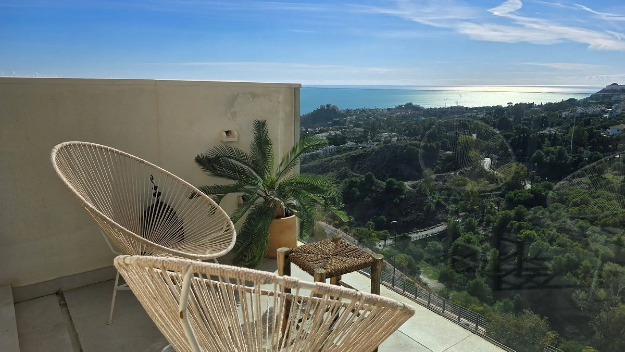 This penthouse in Benalmadena is listed at €545,000 and offers 84 m² of interior living space with two bedrooms, two bathrooms, direct access to a 71 m² total terrace area including a private rooftop solarium, plus two parking spaces and a storage room—al