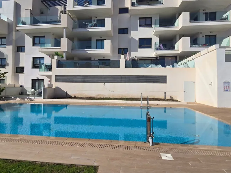 This penthouse in Benalmadena is listed at €545,000 and offers 84 m² of interior living space with two bedrooms, two bathrooms, direct access to a 71 m² total terrace area including a private rooftop solarium, plus two parking spaces and a storage room—al