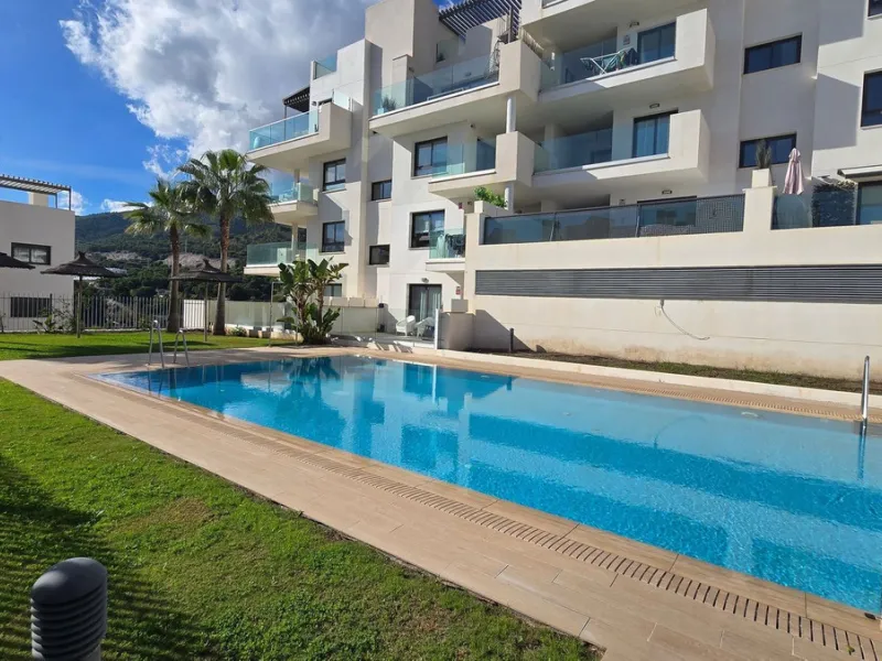 This penthouse in Benalmadena is listed at €545,000 and offers 84 m² of interior living space with two bedrooms, two bathrooms, direct access to a 71 m² total terrace area including a private rooftop solarium, plus two parking spaces and a storage room—al