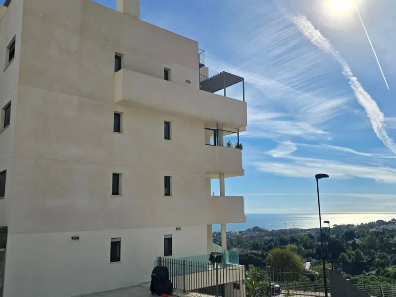 This penthouse in Benalmadena is listed at €545,000 and offers 84 m² of interior living space with two bedrooms, two bathrooms, direct access to a 71 m² total terrace area including a private rooftop solarium, plus two parking spaces and a storage room—al