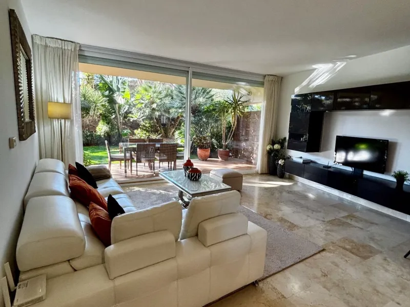 Discover this elegant 2-bedroom, 2-bathroom ground-floor apartment located in the sought-after Milenio complex in Miraflores, perfectly positioned front line to the golf course. This charming home combines comfort, style, and resort-like amenities—ideal f