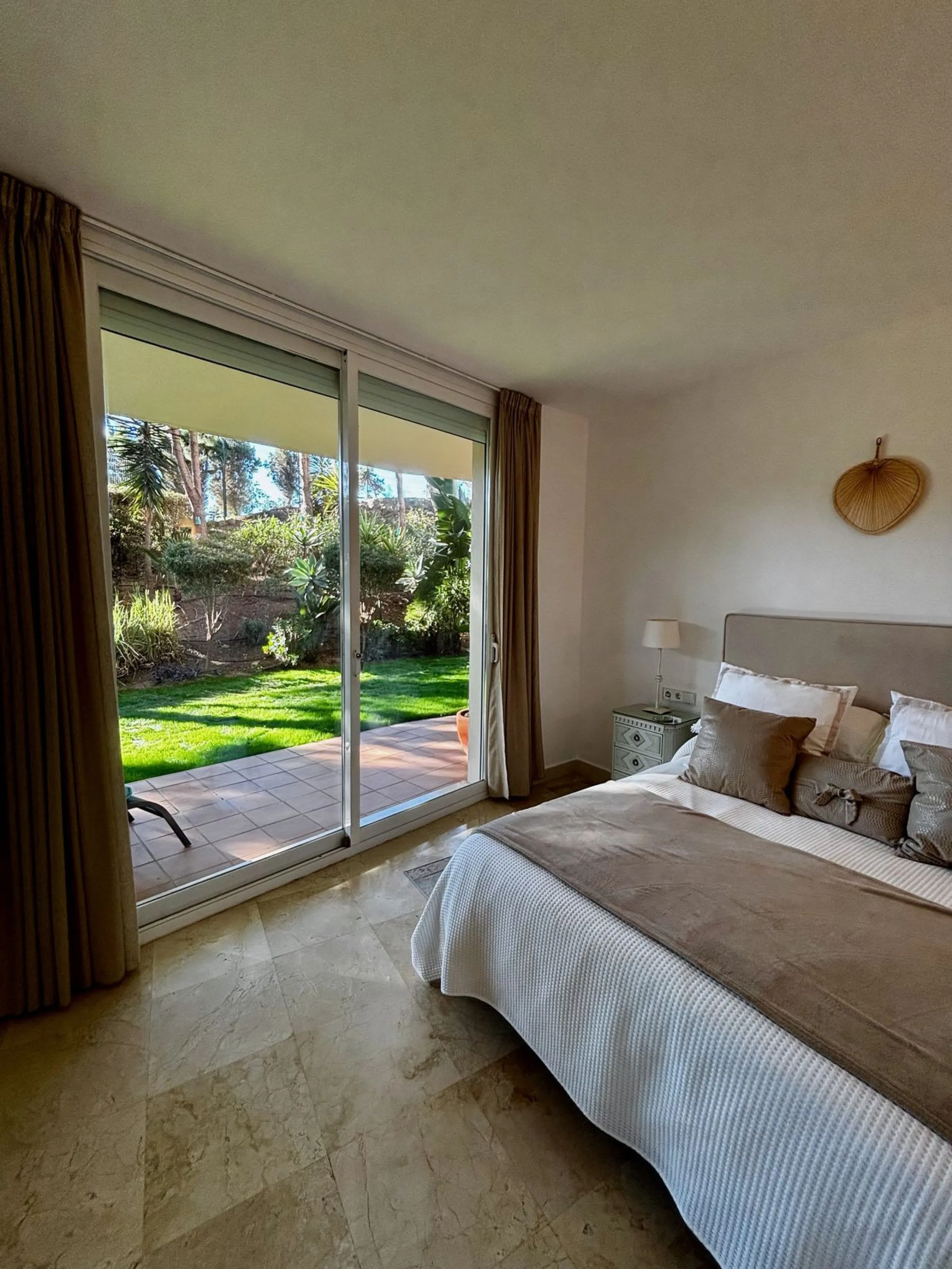 Discover this elegant 2-bedroom, 2-bathroom ground-floor apartment located in the sought-after Milenio complex in Miraflores, perfectly positioned front line to the golf course. This charming home combines comfort, style, and resort-like amenities—ideal f