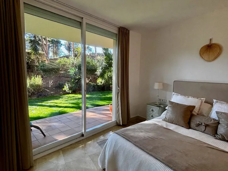 Discover this elegant 2-bedroom, 2-bathroom ground-floor apartment located in the sought-after Milenio complex in Miraflores, perfectly positioned front line to the golf course. This charming home combines comfort, style, and resort-like amenities—ideal f