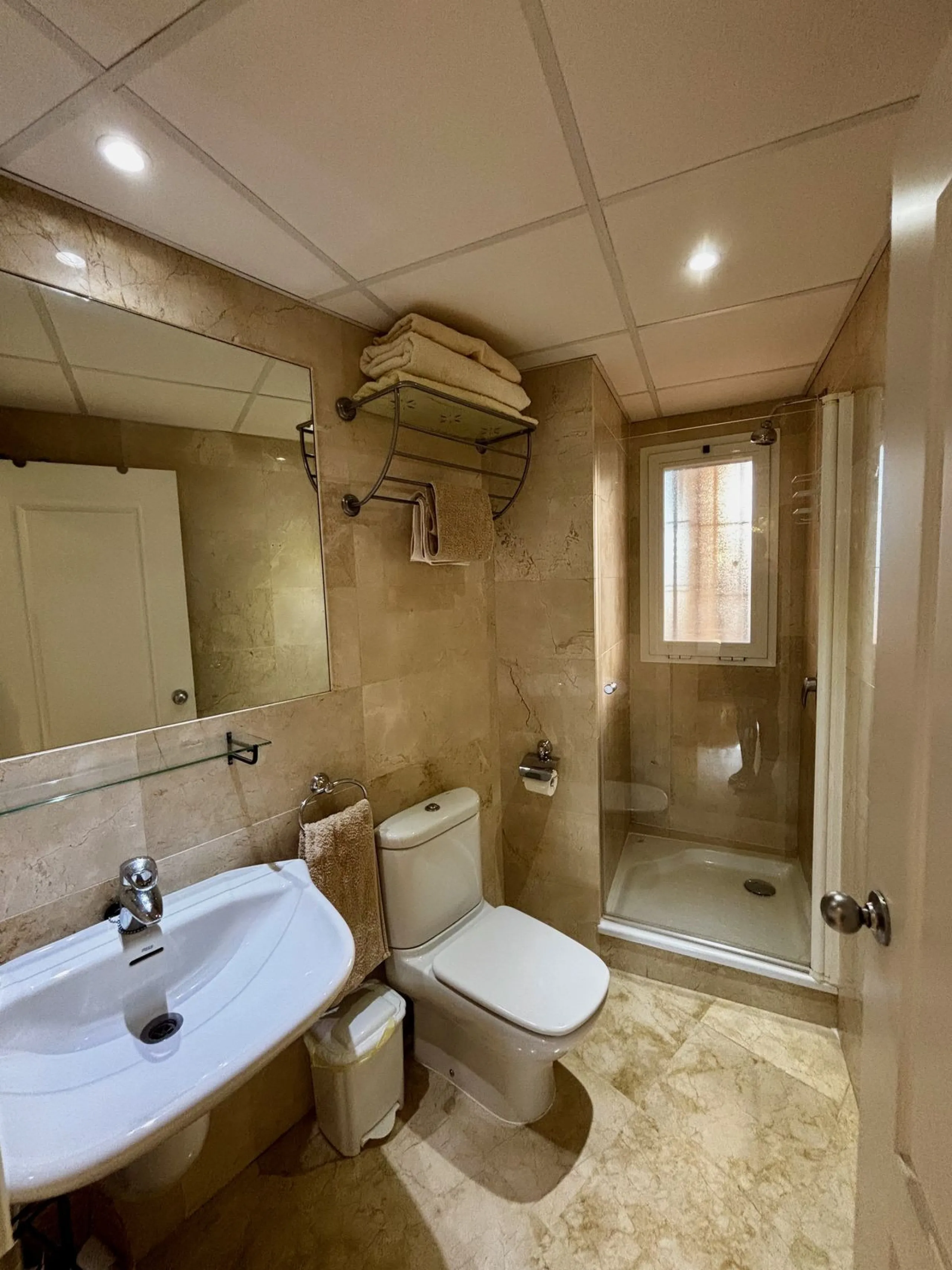 Discover this elegant 2-bedroom, 2-bathroom ground-floor apartment located in the sought-after Milenio complex in Miraflores, perfectly positioned front line to the golf course. This charming home combines comfort, style, and resort-like amenities—ideal f