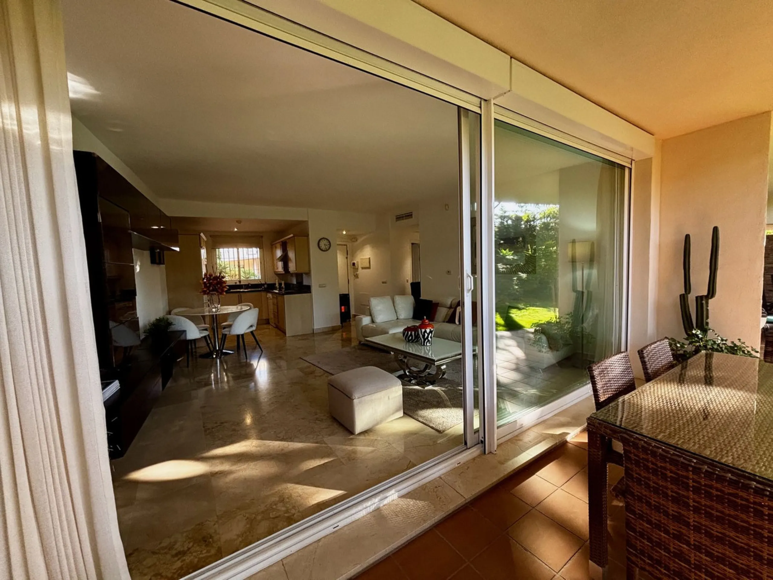 Discover this elegant 2-bedroom, 2-bathroom ground-floor apartment located in the sought-after Milenio complex in Miraflores, perfectly positioned front line to the golf course. This charming home combines comfort, style, and resort-like amenities—ideal f