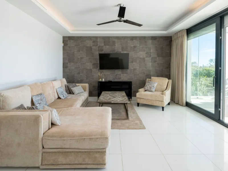 Discover the perfect blend of modern luxury and tranquility in this beautifully renovated 3-bedroom ground-floor apartment located in the prestigious Atalaya Hills. Offering breathtaking views over lush gardens, this stunning corner unit provides exceptio
