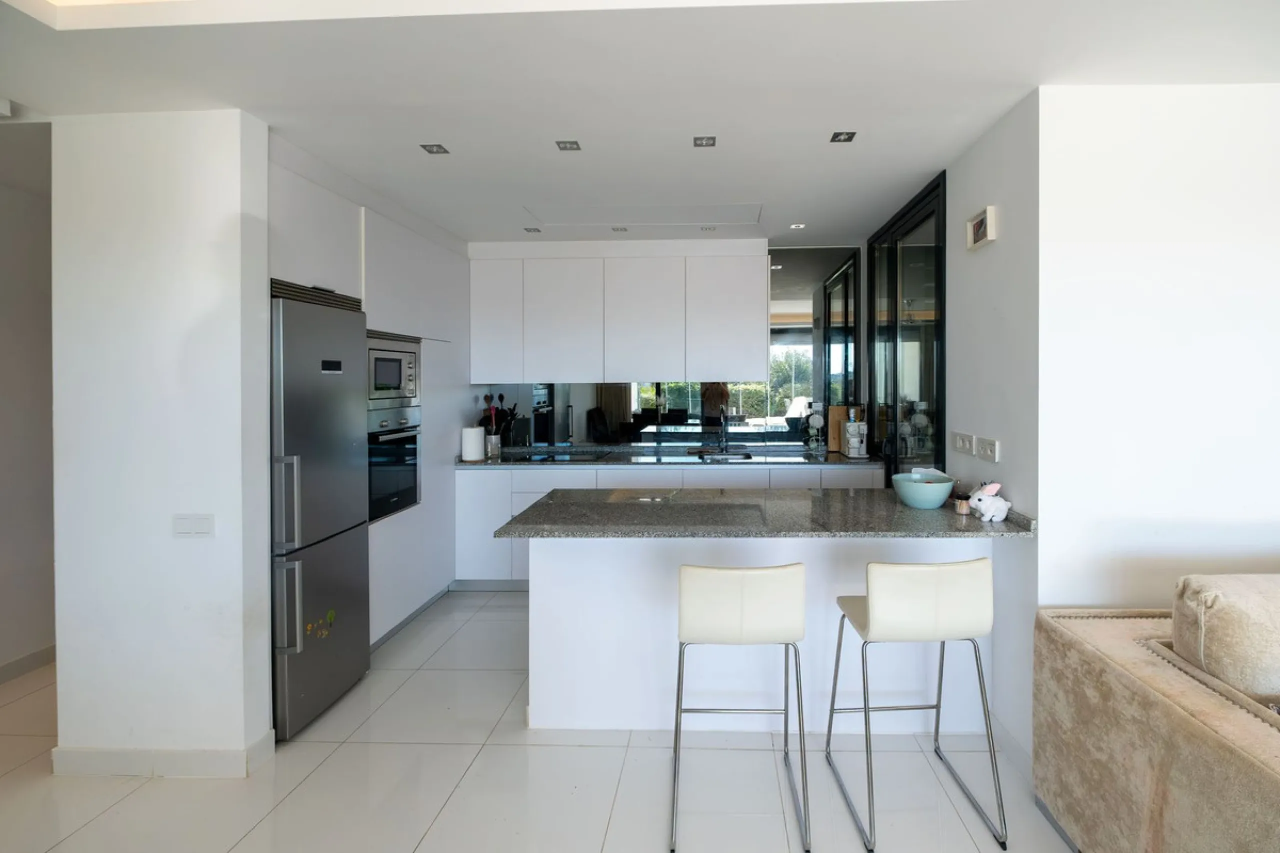 Discover the perfect blend of modern luxury and tranquility in this beautifully renovated 3-bedroom ground-floor apartment located in the prestigious Atalaya Hills. Offering breathtaking views over lush gardens, this stunning corner unit provides exceptio