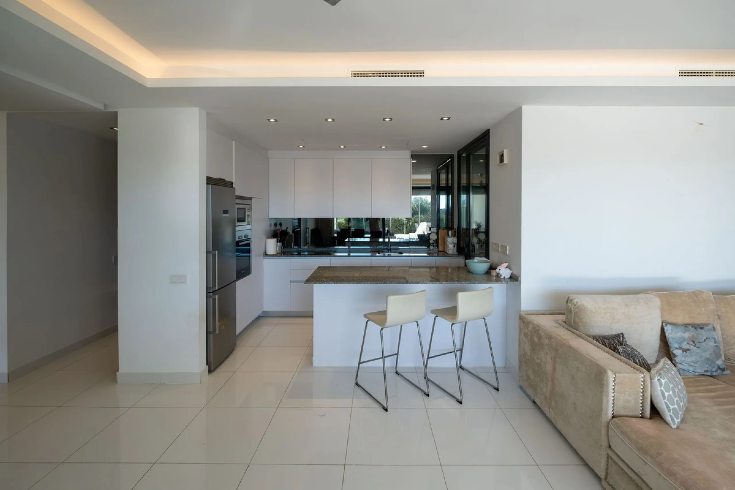 Discover the perfect blend of modern luxury and tranquility in this beautifully renovated 3-bedroom ground-floor apartment located in the prestigious Atalaya Hills. Offering breathtaking views over lush gardens, this stunning corner unit provides exceptio