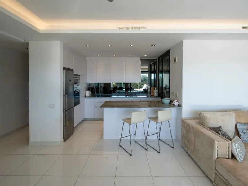 Discover the perfect blend of modern luxury and tranquility in this beautifully renovated 3-bedroom ground-floor apartment located in the prestigious Atalaya Hills. Offering breathtaking views over lush gardens, this stunning corner unit provides exceptio