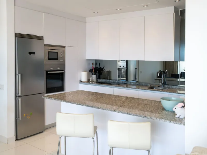 Discover the perfect blend of modern luxury and tranquility in this beautifully renovated 3-bedroom ground-floor apartment located in the prestigious Atalaya Hills. Offering breathtaking views over lush gardens, this stunning corner unit provides exceptio