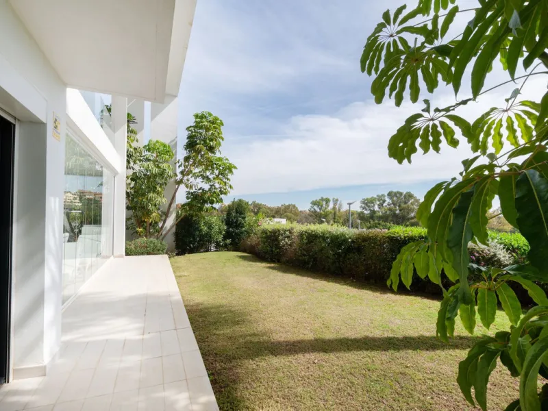 Discover the perfect blend of modern luxury and tranquility in this beautifully renovated 3-bedroom ground-floor apartment located in the prestigious Atalaya Hills. Offering breathtaking views over lush gardens, this stunning corner unit provides exceptio