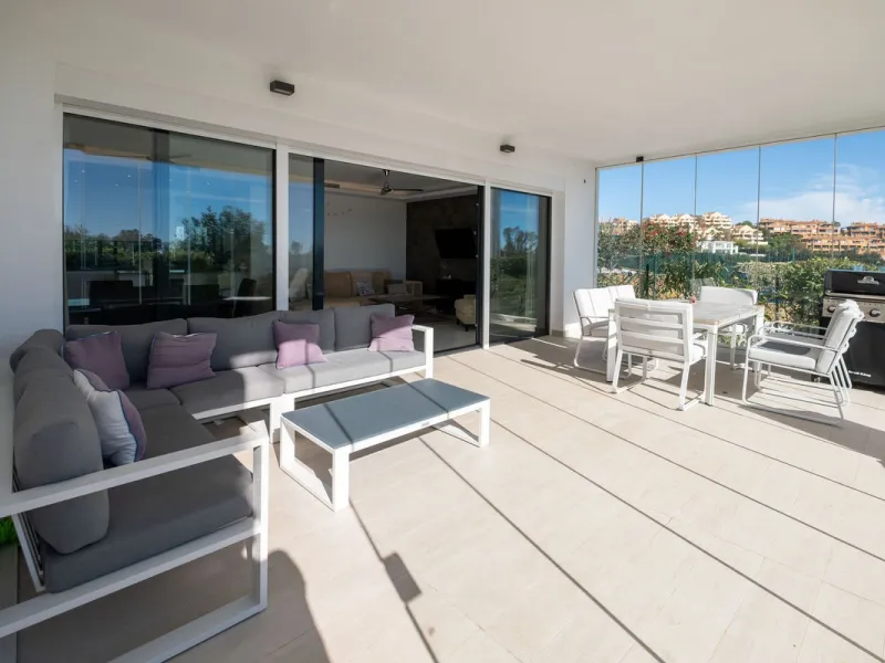 Discover the perfect blend of modern luxury and tranquility in this beautifully renovated 3-bedroom ground-floor apartment located in the prestigious Atalaya Hills. Offering breathtaking views over lush gardens, this stunning corner unit provides exceptio