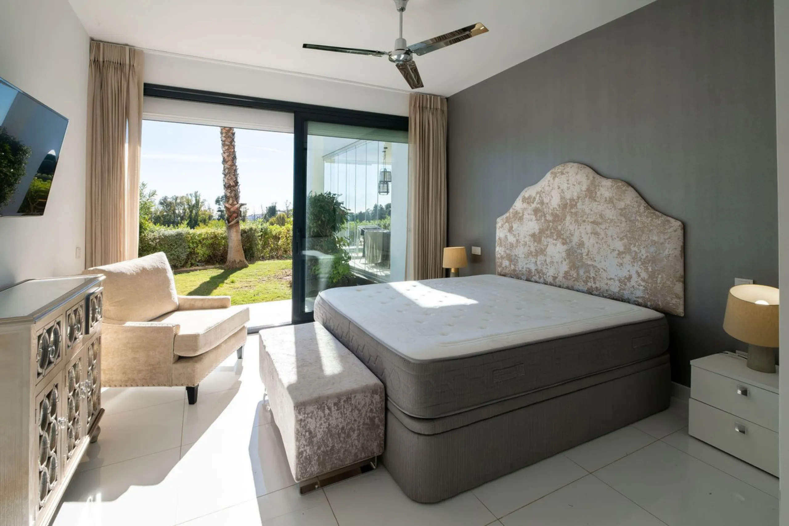 Discover the perfect blend of modern luxury and tranquility in this beautifully renovated 3-bedroom ground-floor apartment located in the prestigious Atalaya Hills. Offering breathtaking views over lush gardens, this stunning corner unit provides exceptio