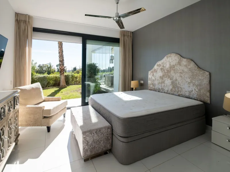 Discover the perfect blend of modern luxury and tranquility in this beautifully renovated 3-bedroom ground-floor apartment located in the prestigious Atalaya Hills. Offering breathtaking views over lush gardens, this stunning corner unit provides exceptio