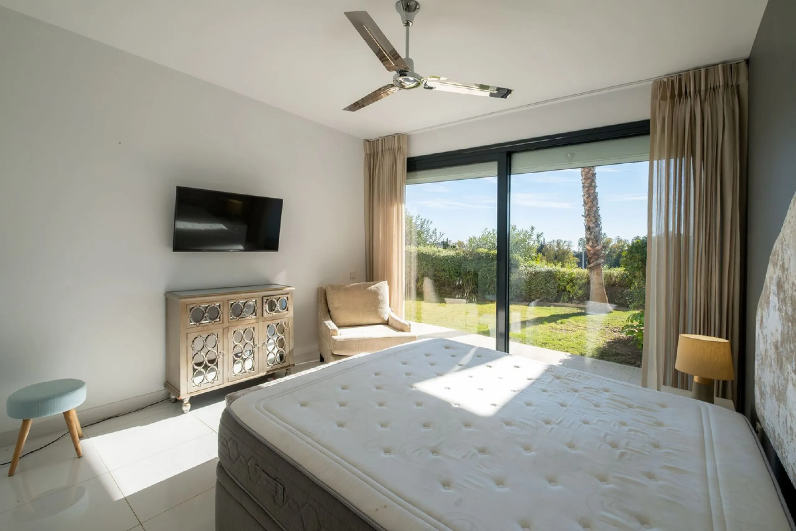 Discover the perfect blend of modern luxury and tranquility in this beautifully renovated 3-bedroom ground-floor apartment located in the prestigious Atalaya Hills. Offering breathtaking views over lush gardens, this stunning corner unit provides exceptio