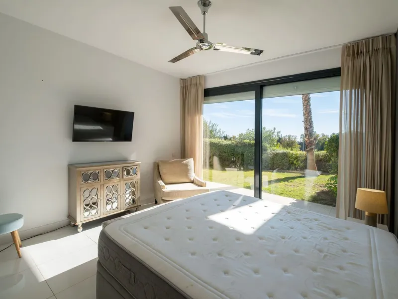 Discover the perfect blend of modern luxury and tranquility in this beautifully renovated 3-bedroom ground-floor apartment located in the prestigious Atalaya Hills. Offering breathtaking views over lush gardens, this stunning corner unit provides exceptio