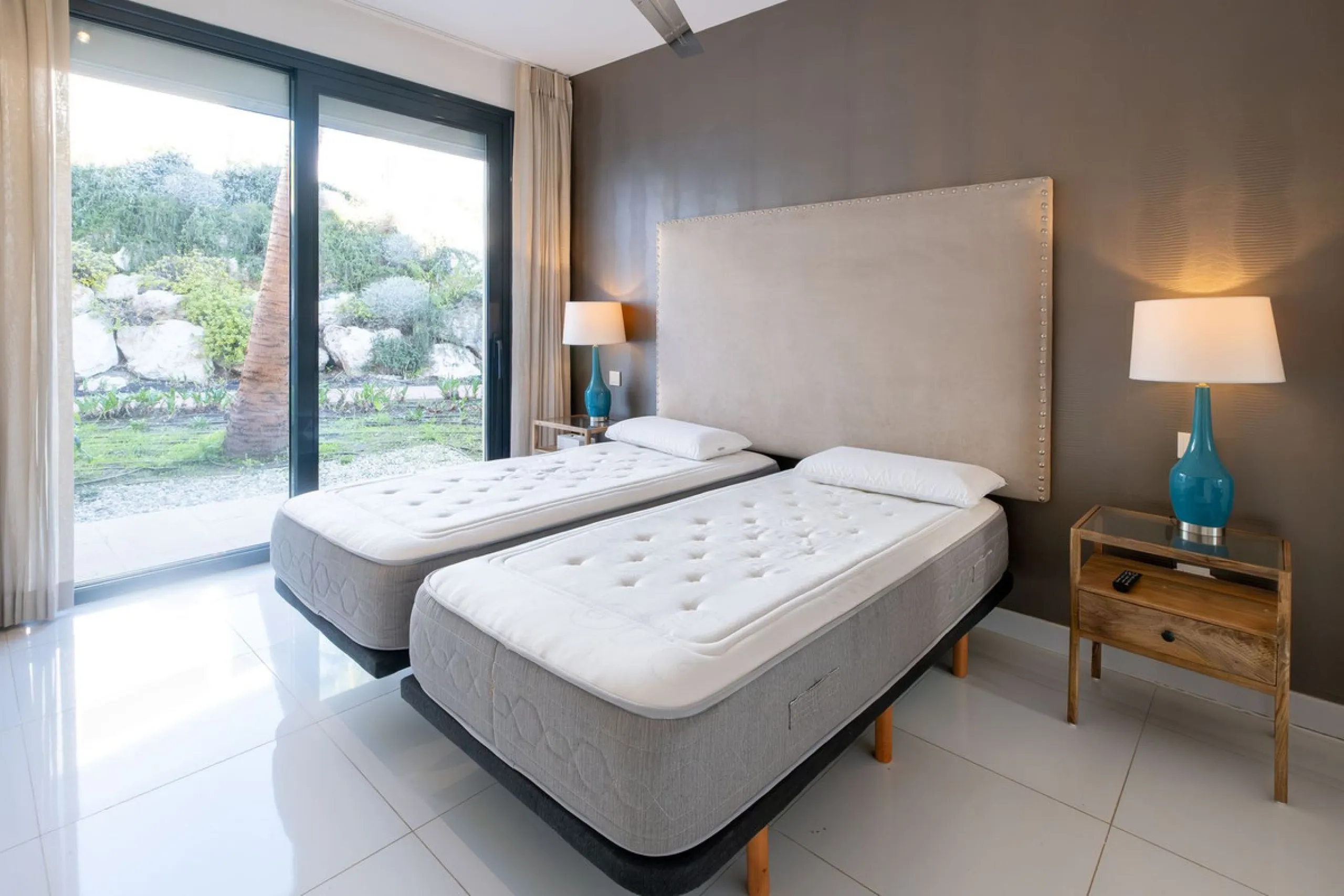 Discover the perfect blend of modern luxury and tranquility in this beautifully renovated 3-bedroom ground-floor apartment located in the prestigious Atalaya Hills. Offering breathtaking views over lush gardens, this stunning corner unit provides exceptio
