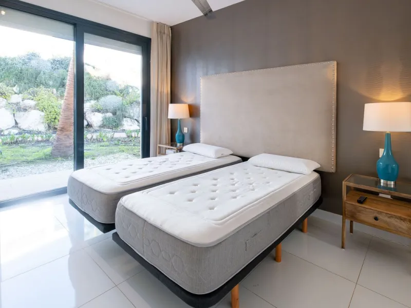 Discover the perfect blend of modern luxury and tranquility in this beautifully renovated 3-bedroom ground-floor apartment located in the prestigious Atalaya Hills. Offering breathtaking views over lush gardens, this stunning corner unit provides exceptio