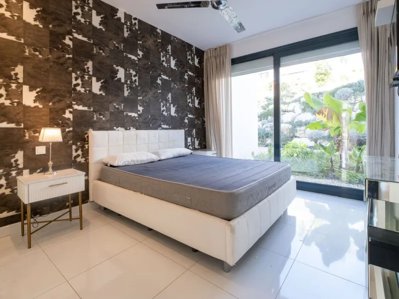 Discover the perfect blend of modern luxury and tranquility in this beautifully renovated 3-bedroom ground-floor apartment located in the prestigious Atalaya Hills. Offering breathtaking views over lush gardens, this stunning corner unit provides exceptio