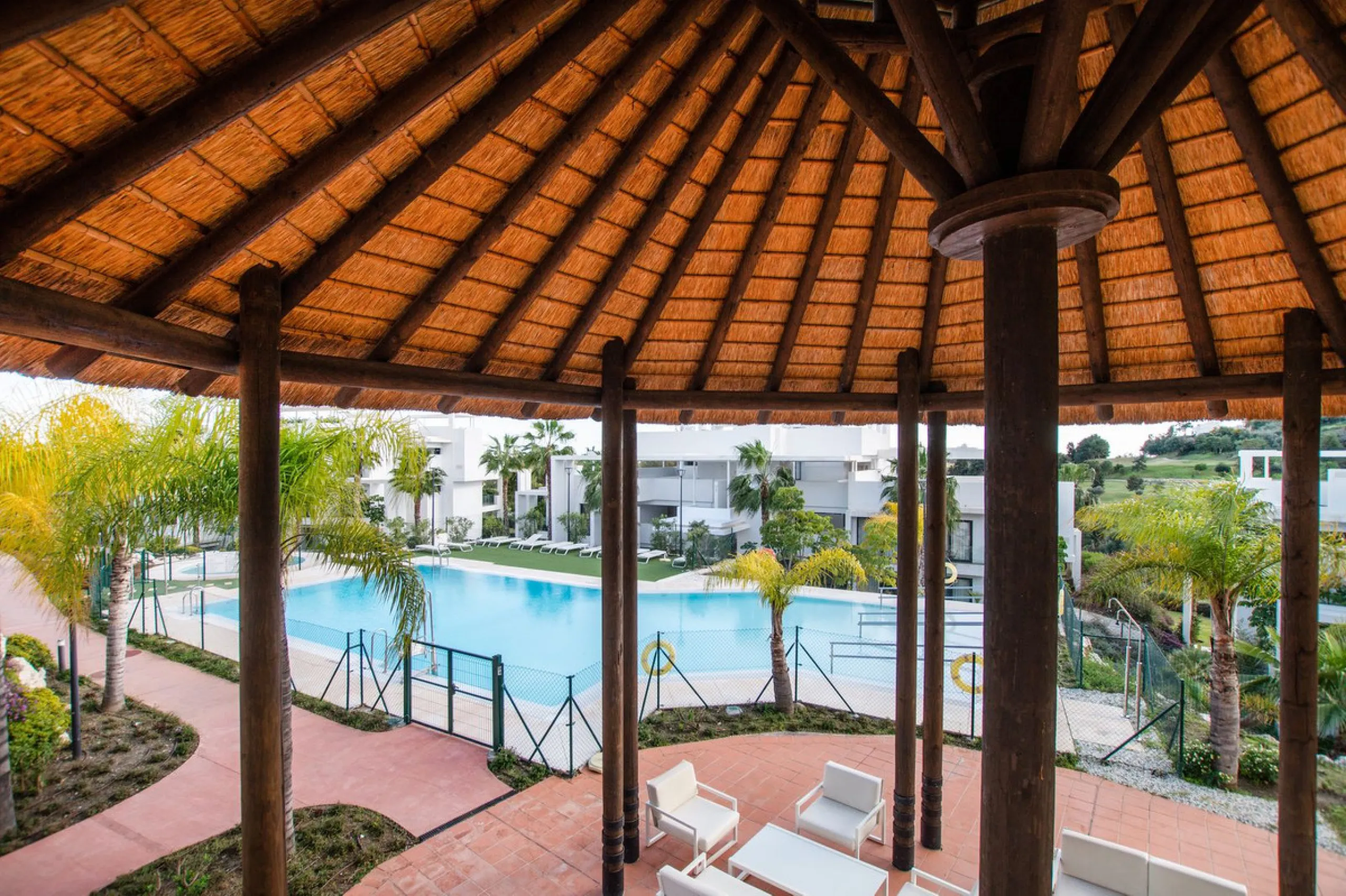 Discover the perfect blend of modern luxury and tranquility in this beautifully renovated 3-bedroom ground-floor apartment located in the prestigious Atalaya Hills. Offering breathtaking views over lush gardens, this stunning corner unit provides exceptio