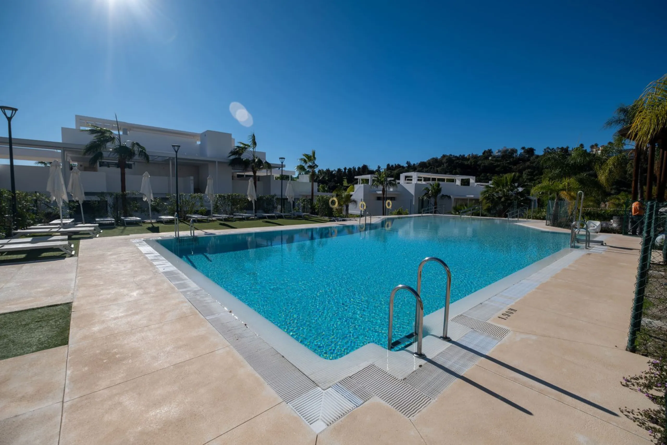 Discover the perfect blend of modern luxury and tranquility in this beautifully renovated 3-bedroom ground-floor apartment located in the prestigious Atalaya Hills. Offering breathtaking views over lush gardens, this stunning corner unit provides exceptio