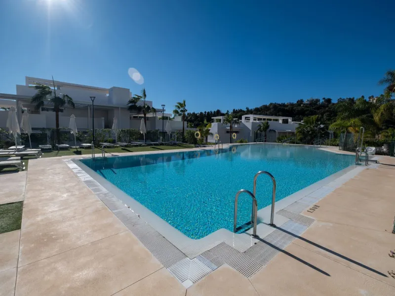 Discover the perfect blend of modern luxury and tranquility in this beautifully renovated 3-bedroom ground-floor apartment located in the prestigious Atalaya Hills. Offering breathtaking views over lush gardens, this stunning corner unit provides exceptio