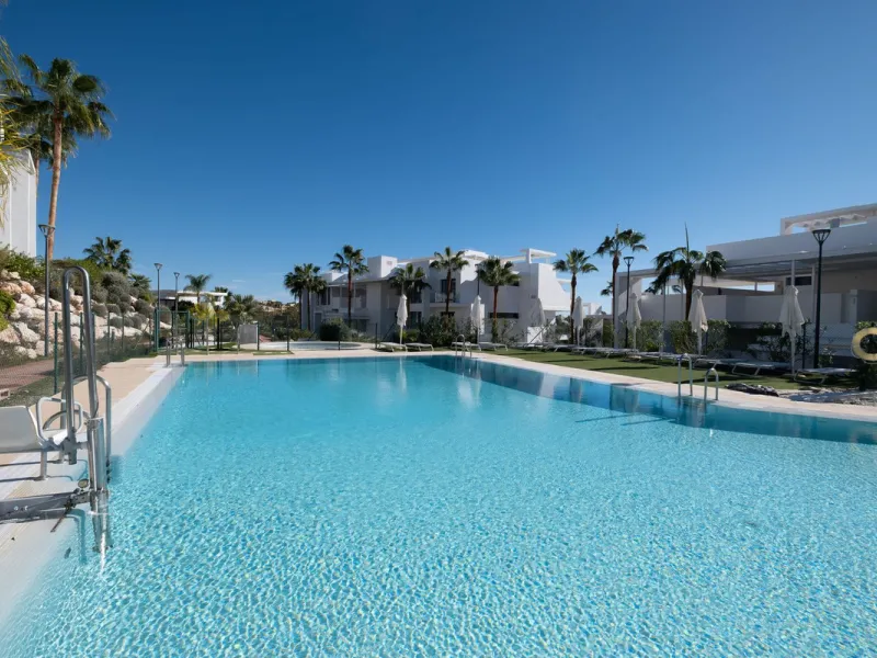 Discover the perfect blend of modern luxury and tranquility in this beautifully renovated 3-bedroom ground-floor apartment located in the prestigious Atalaya Hills. Offering breathtaking views over lush gardens, this stunning corner unit provides exceptio
