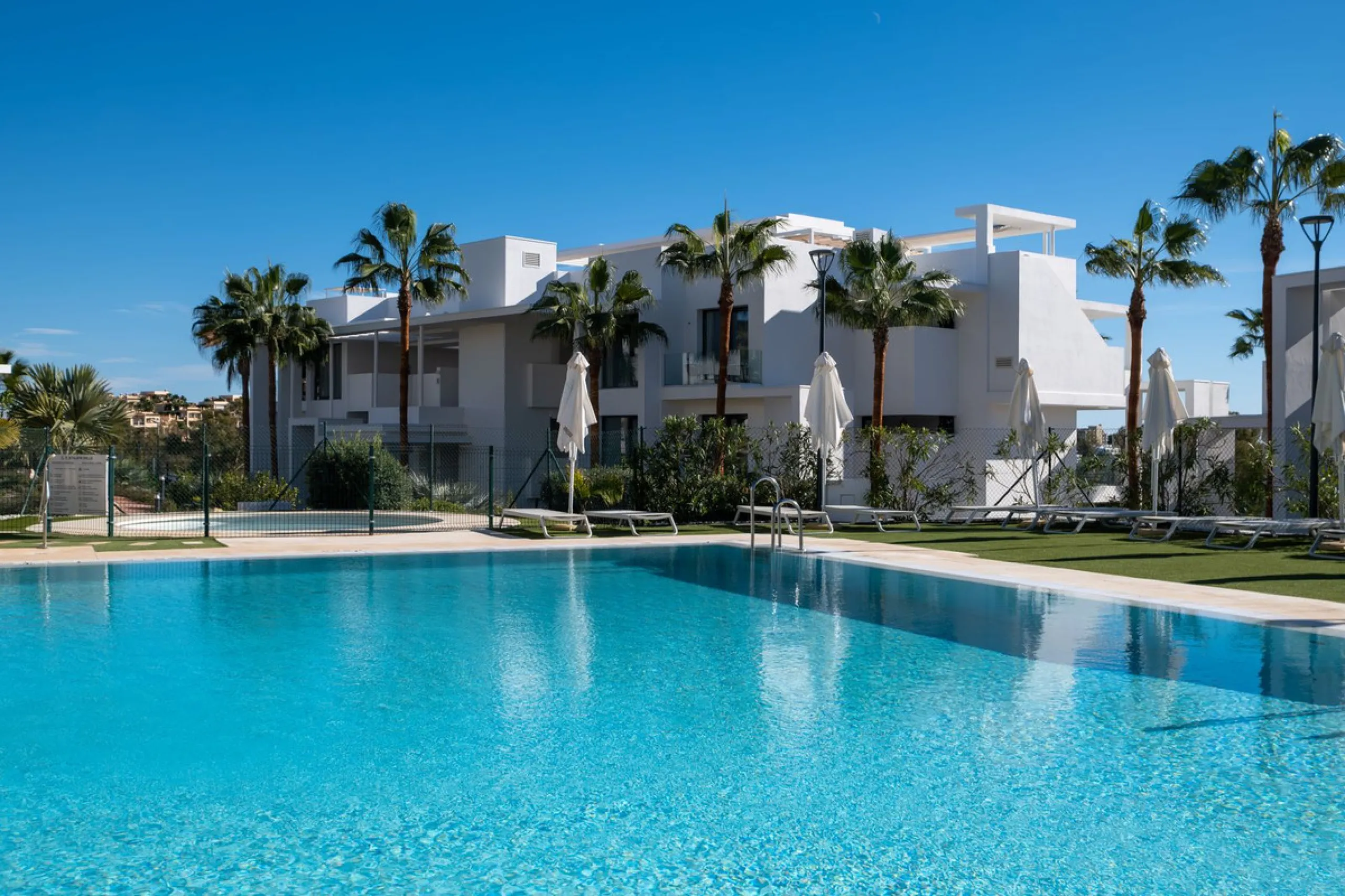 Discover the perfect blend of modern luxury and tranquility in this beautifully renovated 3-bedroom ground-floor apartment located in the prestigious Atalaya Hills. Offering breathtaking views over lush gardens, this stunning corner unit provides exceptio