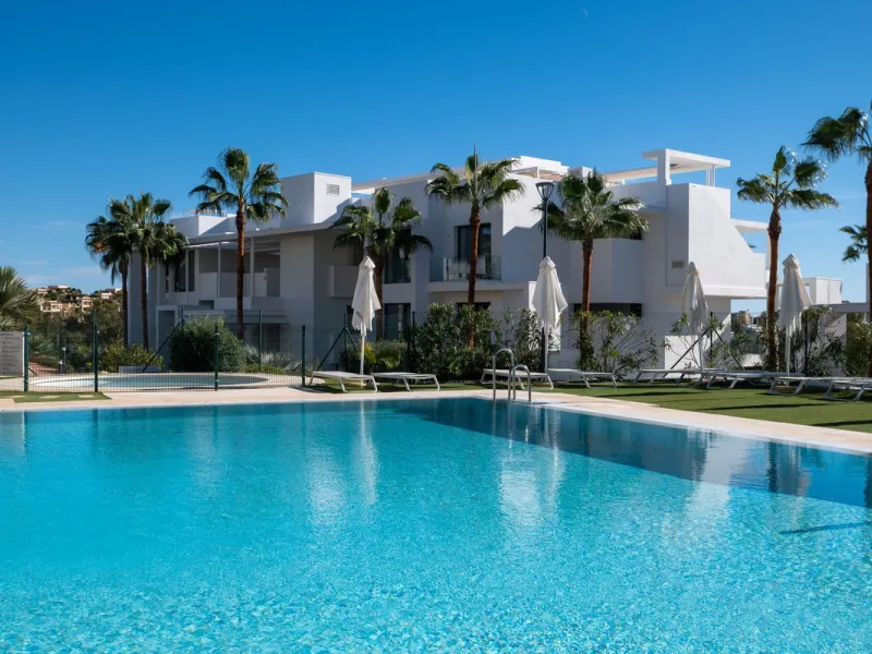 Discover the perfect blend of modern luxury and tranquility in this beautifully renovated 3-bedroom ground-floor apartment located in the prestigious Atalaya Hills. Offering breathtaking views over lush gardens, this stunning corner unit provides exceptio