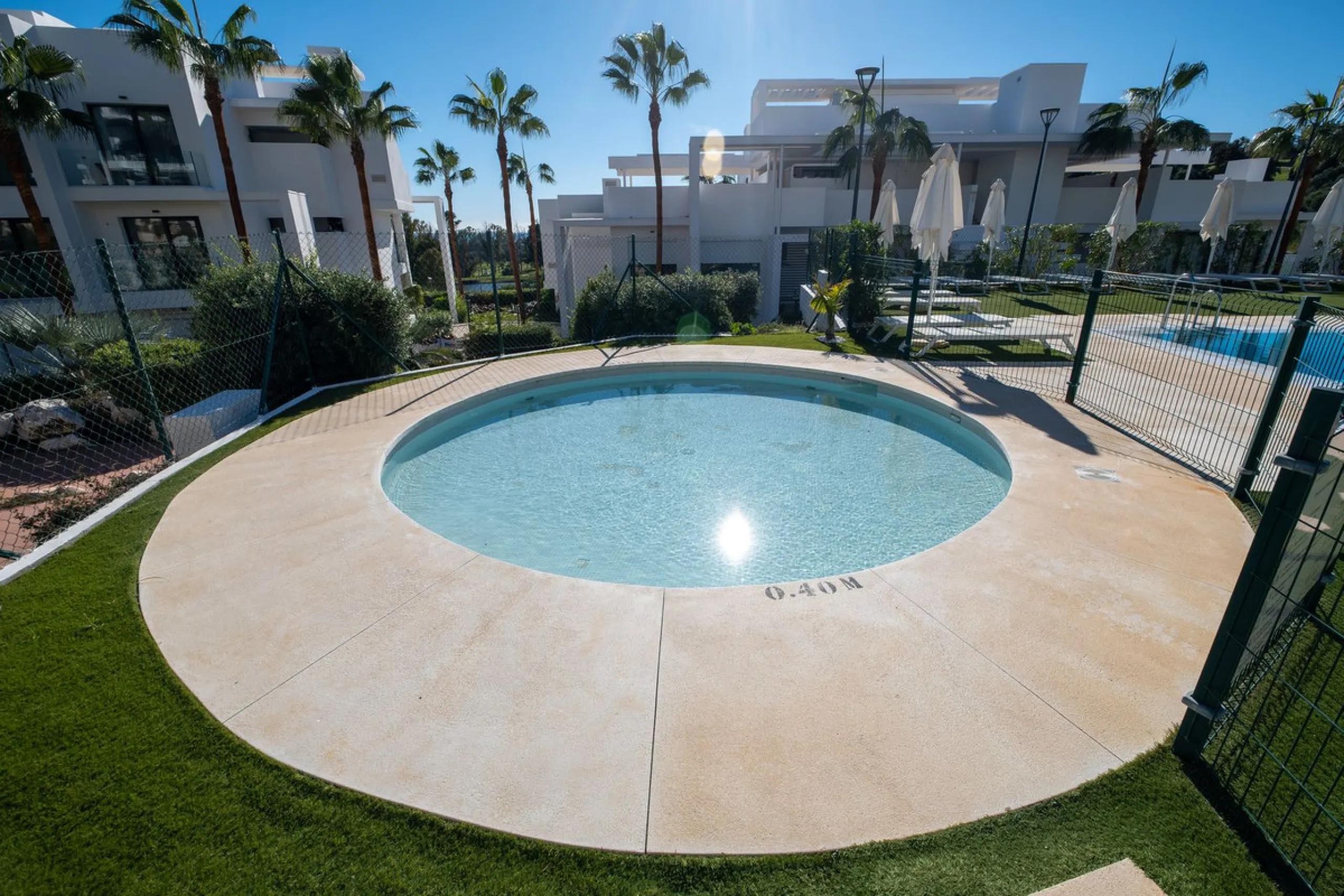 Discover the perfect blend of modern luxury and tranquility in this beautifully renovated 3-bedroom ground-floor apartment located in the prestigious Atalaya Hills. Offering breathtaking views over lush gardens, this stunning corner unit provides exceptio