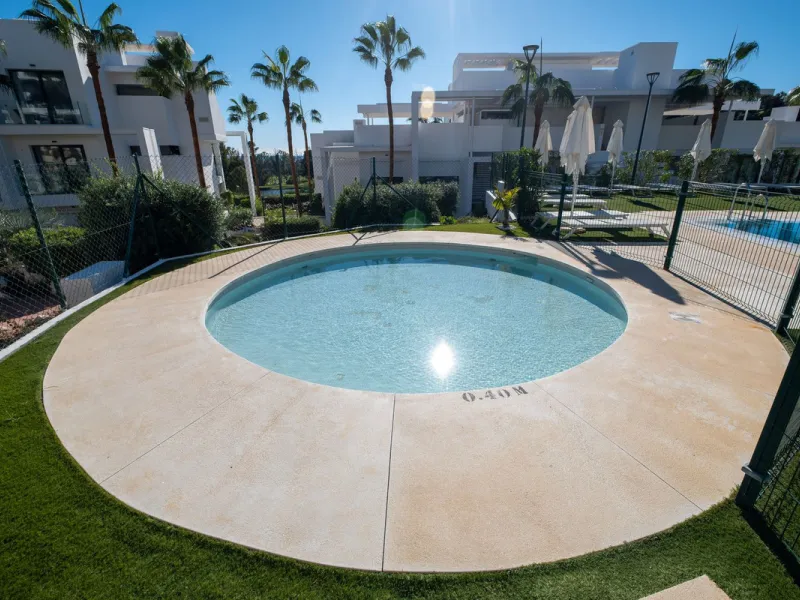 Discover the perfect blend of modern luxury and tranquility in this beautifully renovated 3-bedroom ground-floor apartment located in the prestigious Atalaya Hills. Offering breathtaking views over lush gardens, this stunning corner unit provides exceptio