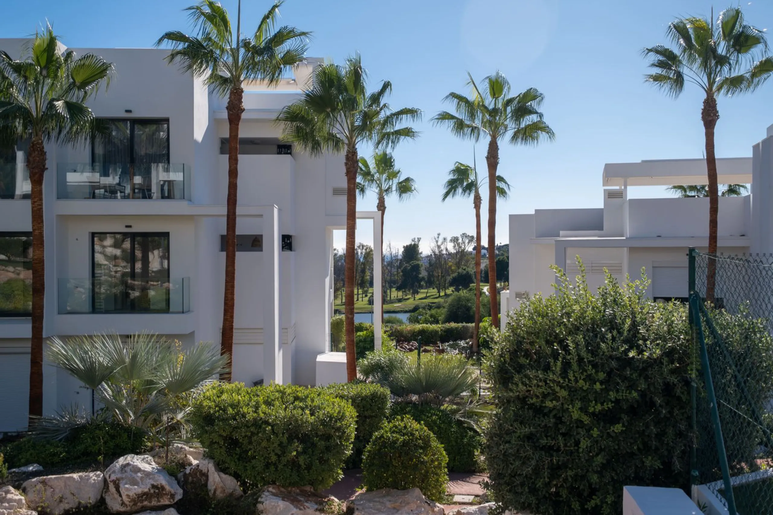 Discover the perfect blend of modern luxury and tranquility in this beautifully renovated 3-bedroom ground-floor apartment located in the prestigious Atalaya Hills. Offering breathtaking views over lush gardens, this stunning corner unit provides exceptio