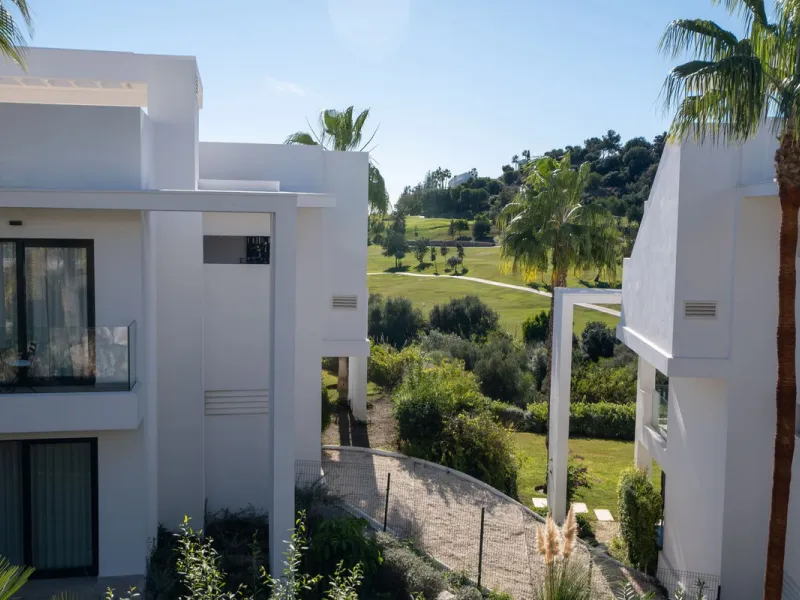 Discover the perfect blend of modern luxury and tranquility in this beautifully renovated 3-bedroom ground-floor apartment located in the prestigious Atalaya Hills. Offering breathtaking views over lush gardens, this stunning corner unit provides exceptio