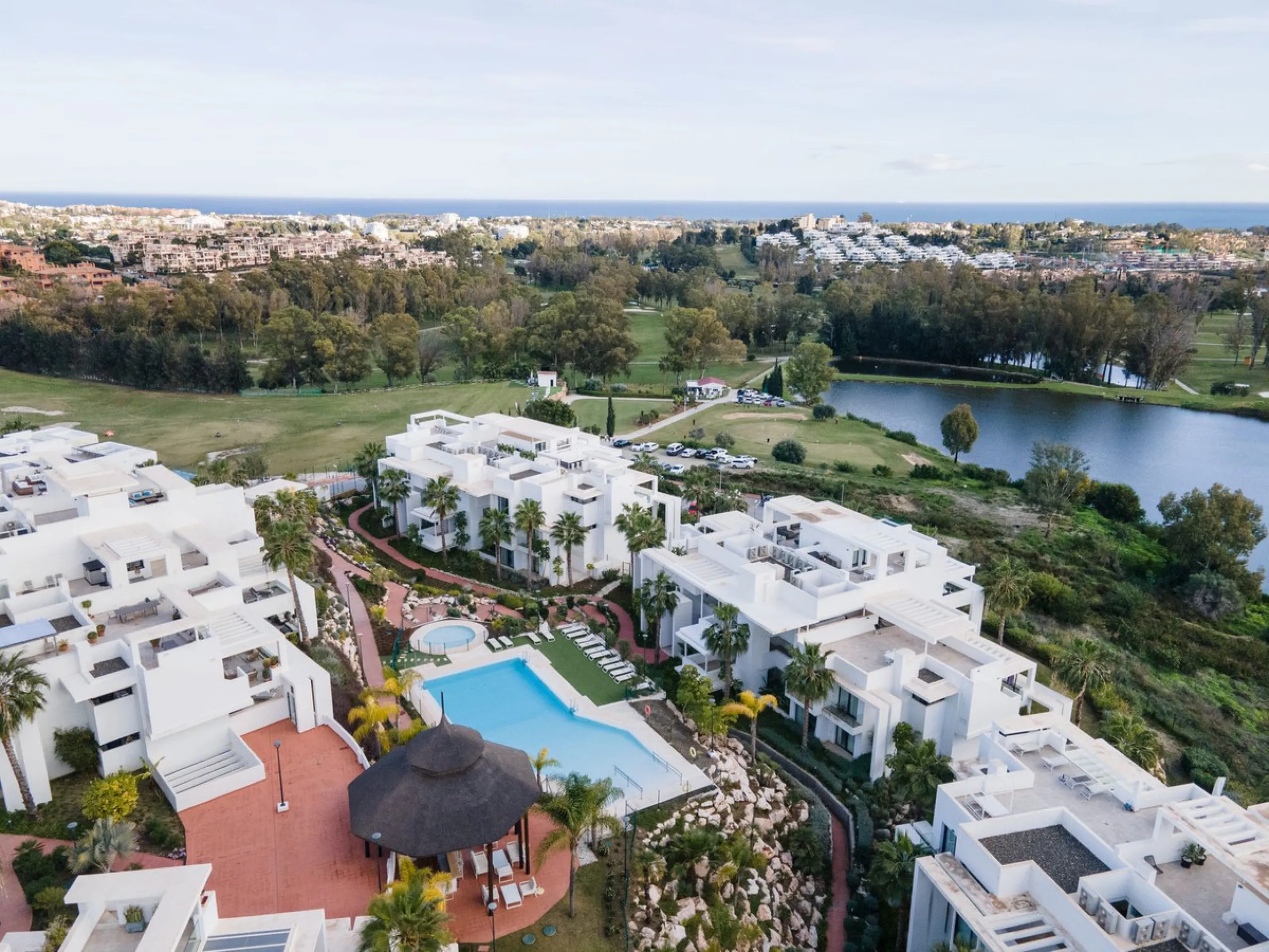 Discover the perfect blend of modern luxury and tranquility in this beautifully renovated 3-bedroom ground-floor apartment located in the prestigious Atalaya Hills. Offering breathtaking views over lush gardens, this stunning corner unit provides exceptio