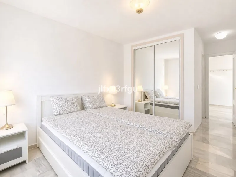 This renovated frontline-golf apartment in La Siesta de Mijas Golf offers a practical layout and a comfortable setting with direct views over the course. Renovated for €50,000  and sold fully furnished, it is ready to use immediately - either as a home or