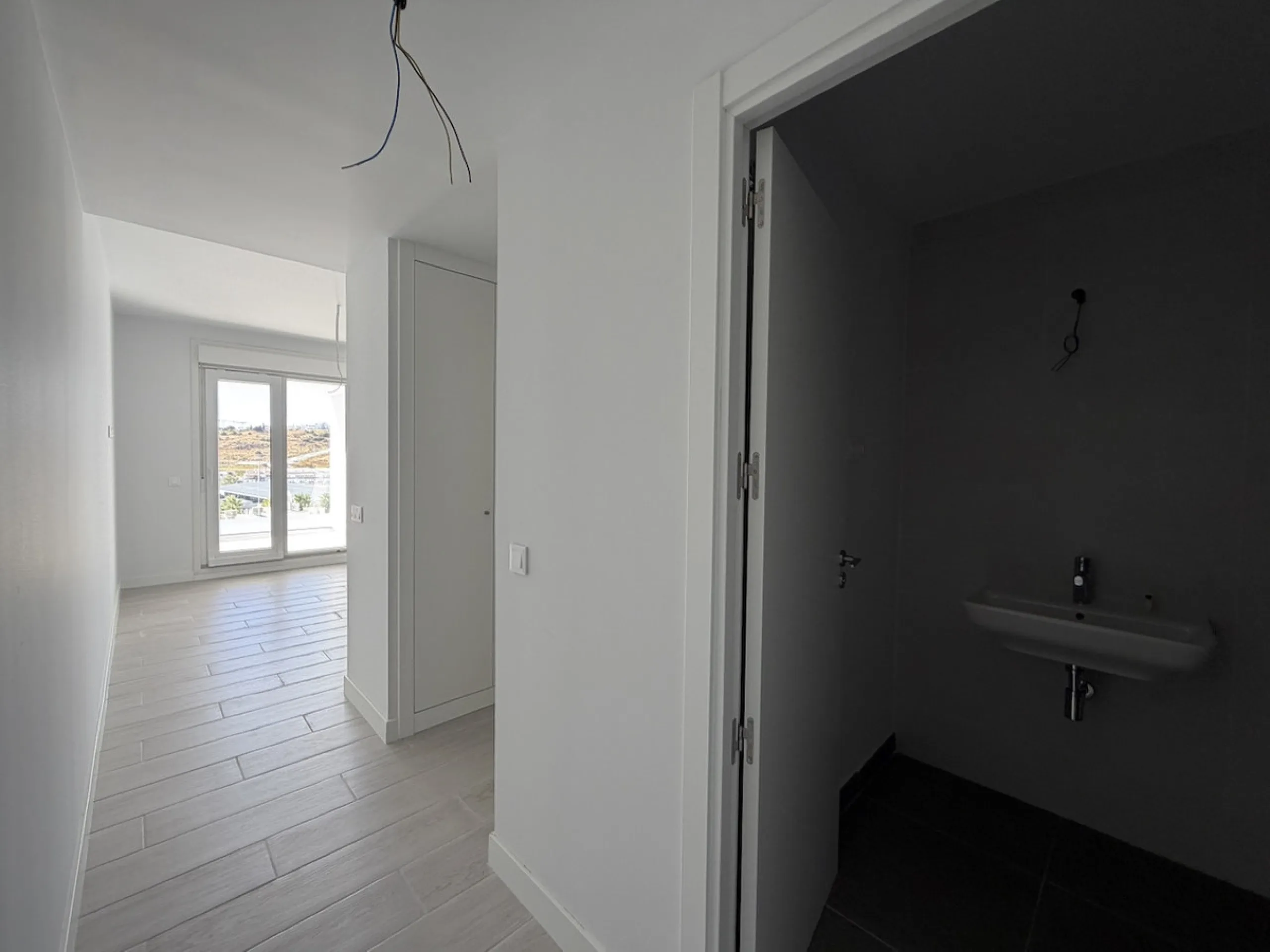 Nestled in the picturesque town of Estepona, Malaga, this newly built three-bedroom apartment offers a harmonious blend of modern design and convenience. Exclusively available through sole agency, this property is a prime example of contemporary living, b