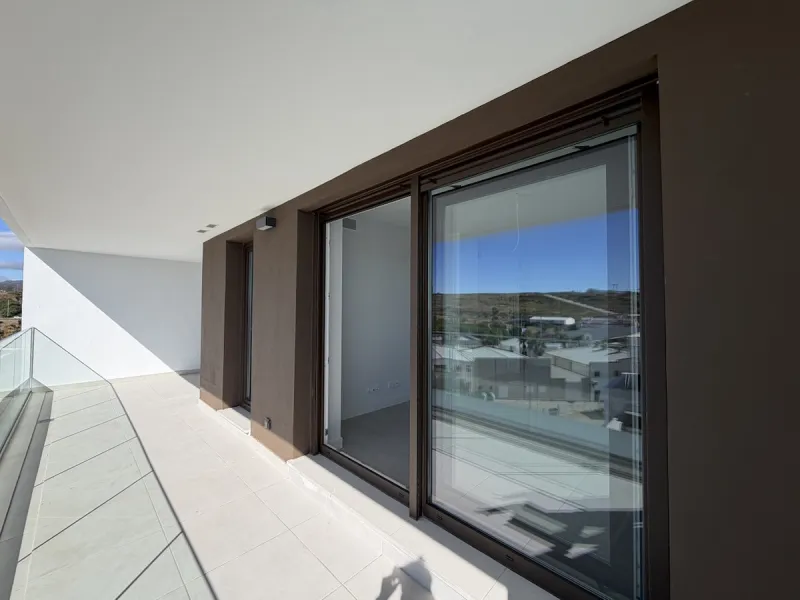 Nestled in the picturesque town of Estepona, Malaga, this newly built three-bedroom apartment offers a harmonious blend of modern design and convenience. Exclusively available through sole agency, this property is a prime example of contemporary living, b
