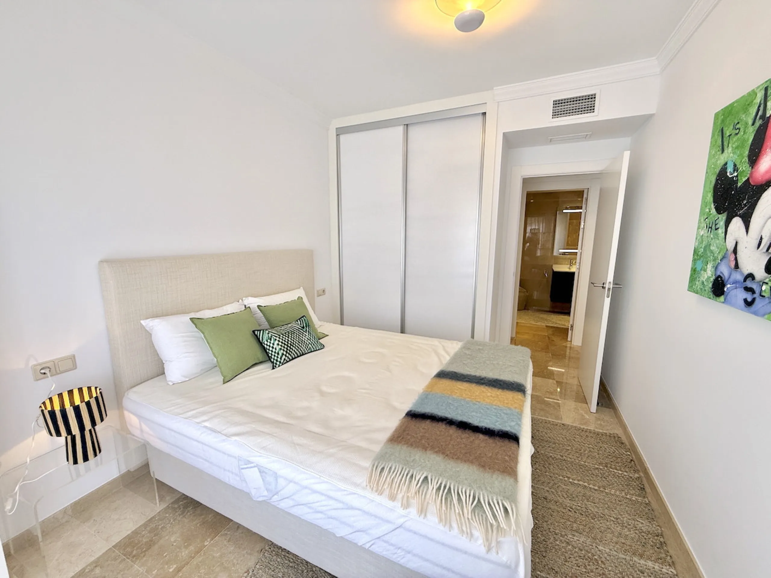 This elegant three-bedroom apartment with 2 private parkings is situated in the sought-after area of La Mairena, Marbella East, offering a harmonious blend of comfort, style, and convenience. The property boasts a generous built area of 148m² complemented