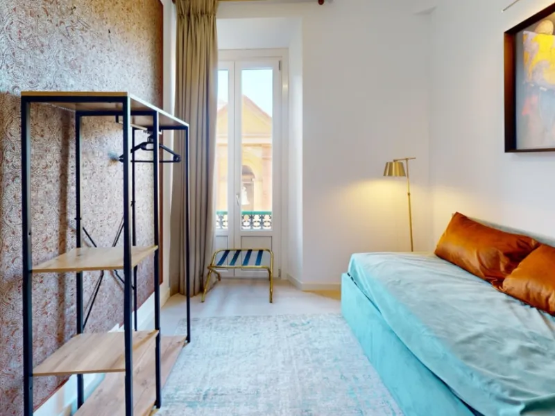 Experience this beautifully renovated top floor apartment in a stylish blend of luxury, aristocracy, and modern design. Located on the third floor (with elevator access), this south-west facing apartment is flooded with natural light and boasts high ceili