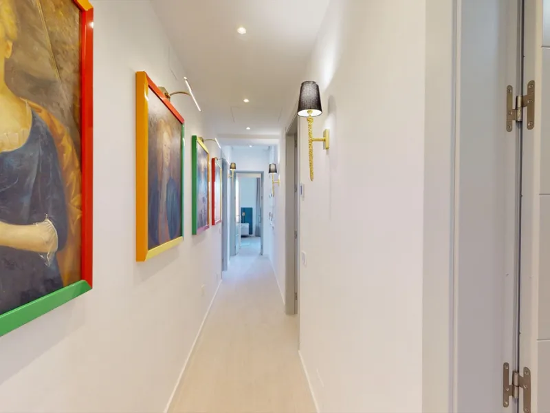 Experience this beautifully renovated top floor apartment in a stylish blend of luxury, aristocracy, and modern design. Located on the third floor (with elevator access), this south-west facing apartment is flooded with natural light and boasts high ceili